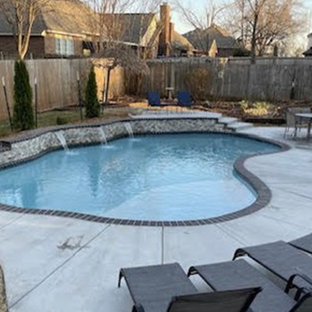 Irregular recessed fiberglass pool